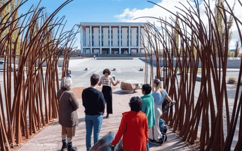 Sita Sargeant leading a She Shapes History walking tour — building community through tours in Canberra
